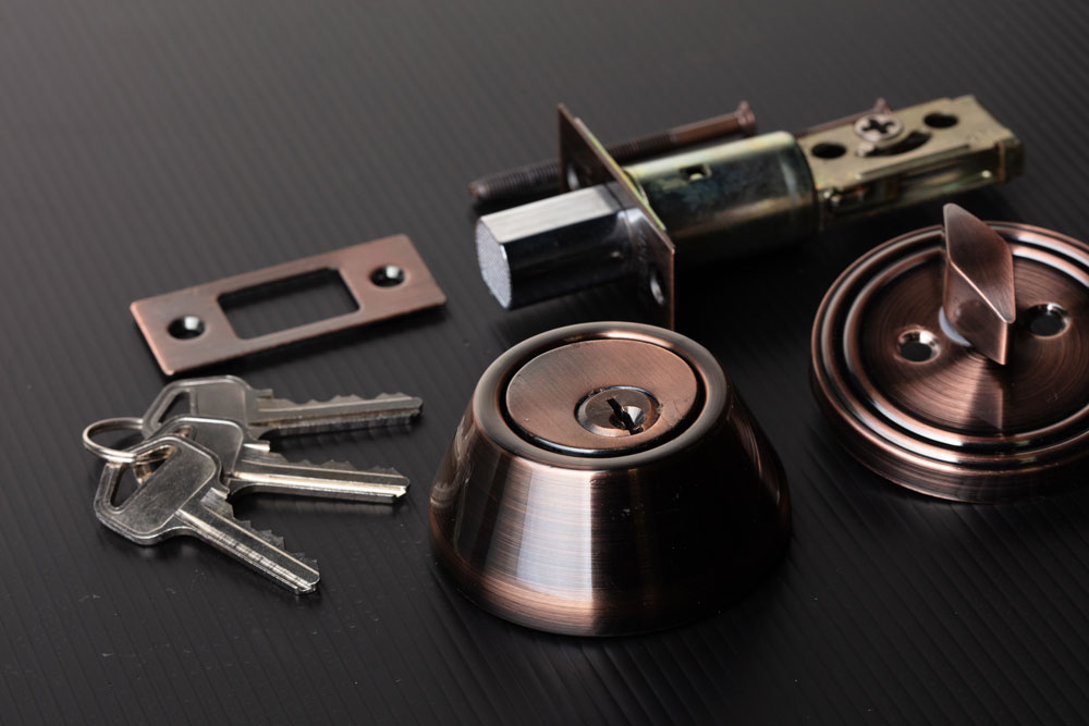 Door lock hardware prepared for master key system installation in Houston